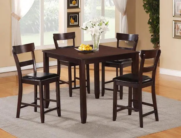 a brown color square dining table with four chairs