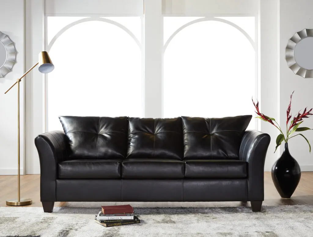 three seater black color leather sofa