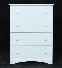 a white side table with four drawers