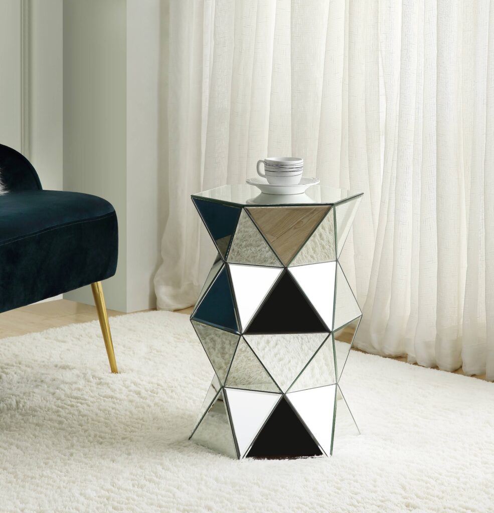 a cup on the glam pedestal side table