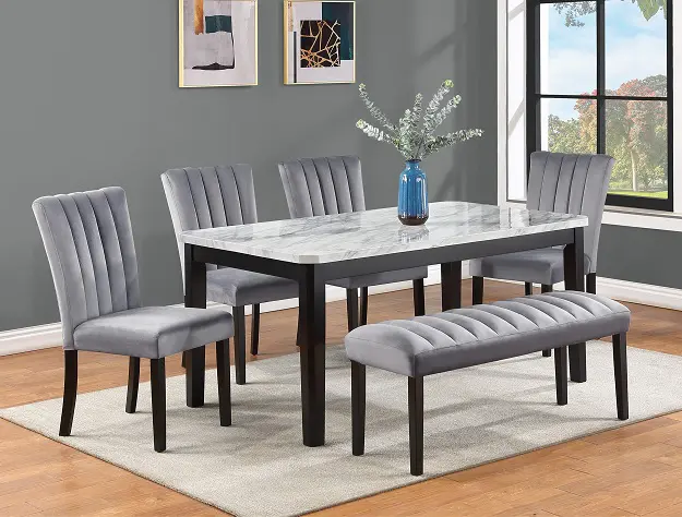 a grey color dining table with four chairs and a bench